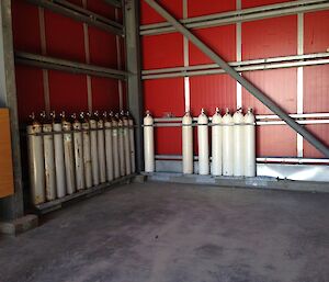 Racks of air and oxygen cylinders in the emergency vehicle shelter at Casey station