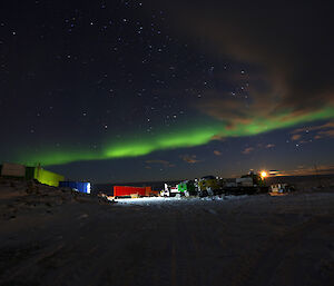 The aurora australis above Casey during April 2014 and the full moon rising