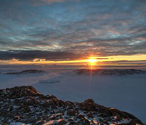 Sunset with inversion visible in the cloud layers (upside down)