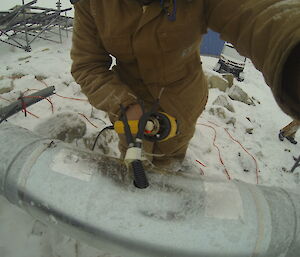 Preparing heat Trace cables that are used to keep a sewer pipe from freezing