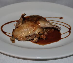 Quail and couscous with pomegranate sauce