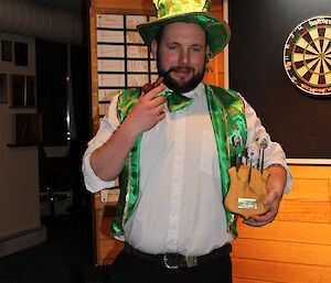 Scott Clifford with the dart tournament trophy at Casey