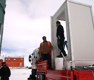 A cold porch is delivered to Wilkins Aerodrome for installation through the summer