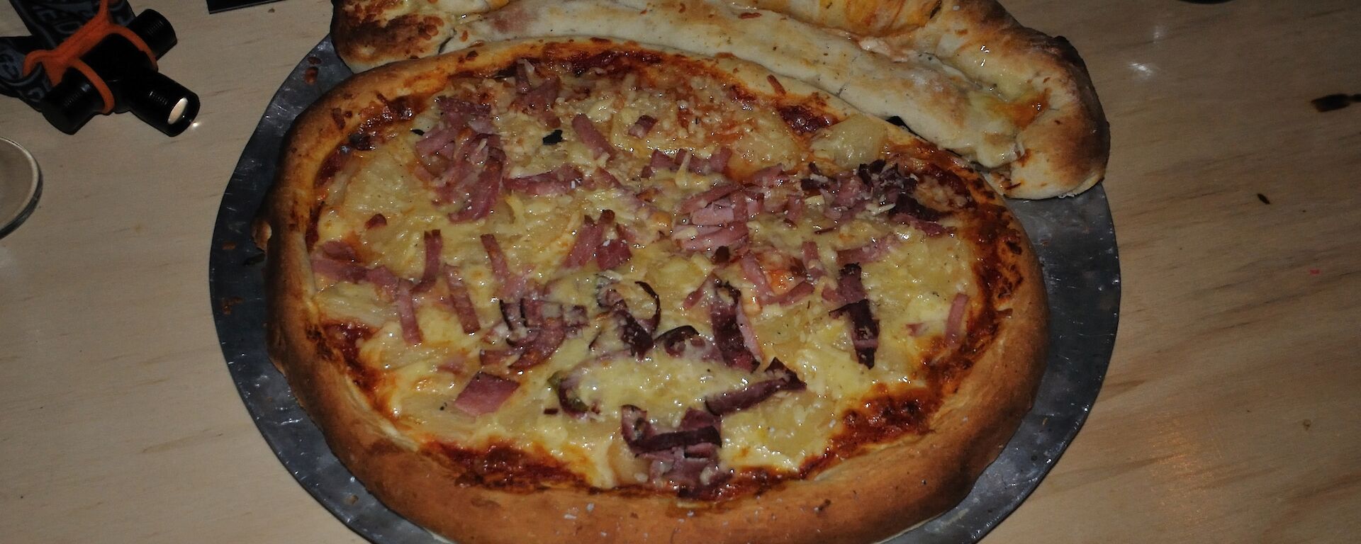A pizza fresh from the wood fired oven at Wilkes Hilton hut near Casey 2014
