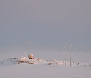 Old communications antenna covered in ice at the old Wilkes Station