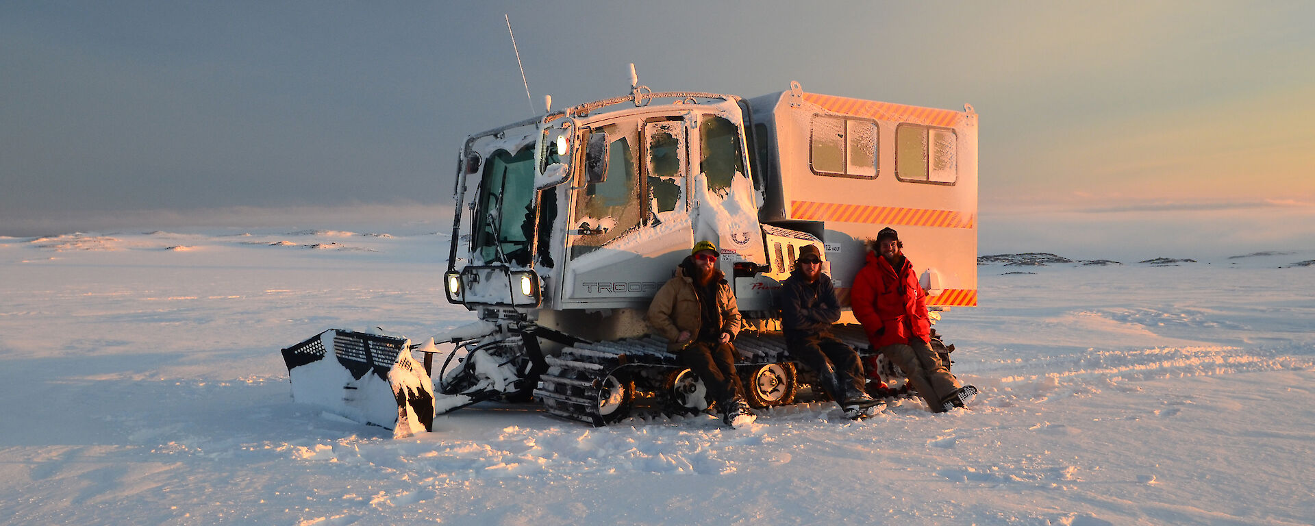 Expeditioners take a break on the trooper, en-route to Robbo’s Hut