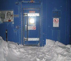 The north entrance of the balloon shed with snow either side, Casey station.