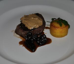 Sous vide beef with Morilles mushroom, fondant potato and Porcini foam, arranged artistically