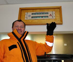 Pete Hargreaves pointing to the temperature read out in the dining room at Casey 2014