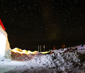 The outside movie at Casey with the aurora showing faintly in the sky — Casey Midwinter 2014