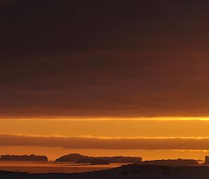 At Casey during June the sun rises then sets again very quickly — the photo is sunrise and sunset all in one