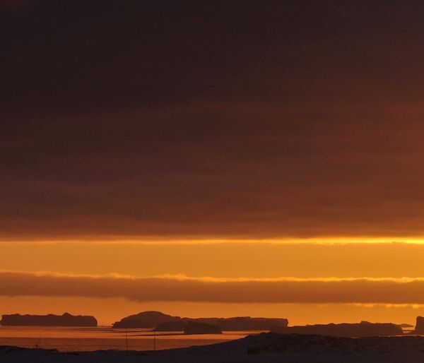 At Casey during June the sun rises then sets again very quickly — the photo is sunrise and sunset all in one