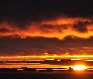 A stunning sunset darkens to black at Casey during June 2014