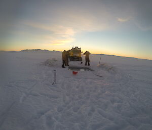 The pool cut in the sea ice at Casey filling with water before the final pieces of ice at the bottom of the pool have been removed