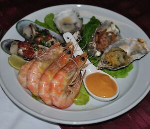 Closeup of the prawns, oysters, and mussels