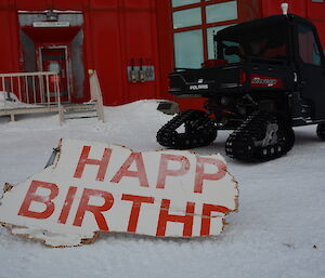 The remains of the trashed Happy Birthday sign back at Casey