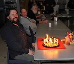 Eddie Dawson with his 40th birthday cake ready to blow out his candles