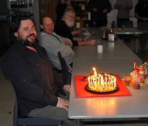 Eddie Dawson with his 40th birthday cake ready to blow out his candles
