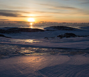 The sun setting over the sea at Casey