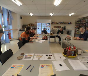 Expeditioners at Casey doing a Brain Break quizz with their morning tea for National Science Week August 2014