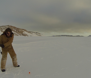 Steve Hankins playing golf on the sea ice at Casey August 2014