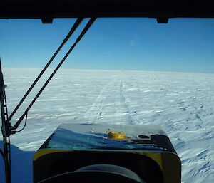 The view out over the ice from the perspective of sitting in the large Challenger tracked vehicle