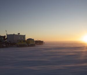 A beautiful golden sunrise over the ice on the final morning of the traverse