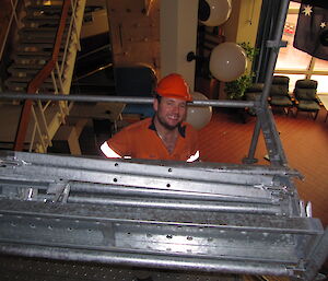 Setting up scaffolding in the Red Shed at Casey winter 2014