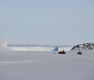 Quad riders parked at the base of the Browning peninsula, with glacier views in the background