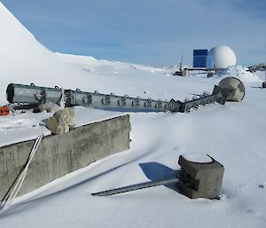 UHF receiver dish and mast pn the ground after a storm at Casey 2014