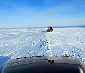 Dragging a beam to define the Casey skiway before grooming