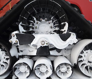 Blizzard-created snow patterns on vehicle wheels at the Casey skiway