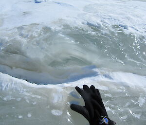 Frozen layers of discoloured ice