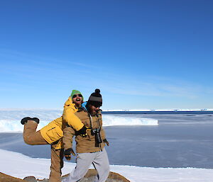 Daniel Laban and Steve Hankins larked about in front of the Vanderford Glacier