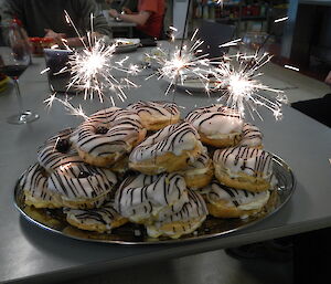 Petes birthday cake on station — a pile of cream filled iced Bavarian cream rings