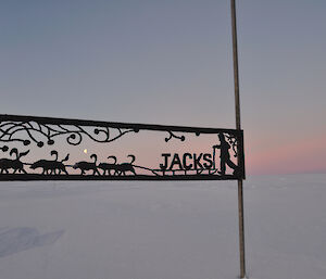 Wrought iron sign on the plateau marking the turn off to Jack’s hut
