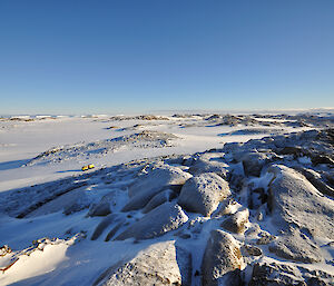 Browning Peninsula in winter — a landscape of rocks and snow, very plain and bleak looking but also beautiful