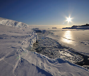 Sun setting at the end of winter at Wilkes on the Clark Peninsula