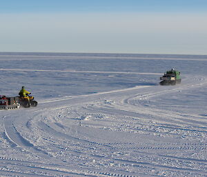 Cary Collis Steve McInnerney and Matt Melhuish postion the Hägglunds and Emergency Skidoo for the planes arrival