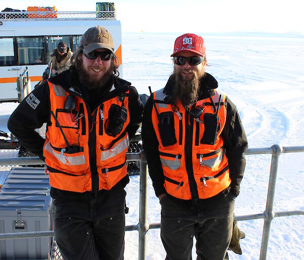 Steve McInnerney and Cary Collis at the Casey skiway dressed in their aviation uniform awaiting the first flight of the 2014–15 Casey summer