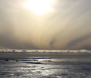 Cirrus clouds and the setting sun at Casey