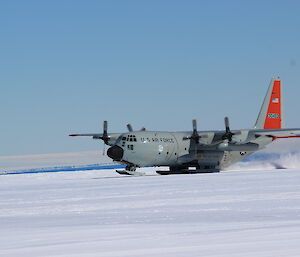 A C-130 Hercules touches down at the Casey Skiway