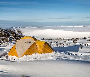 A tent pitched alongside the Vanderford glacier, on a beautiful sunny morning