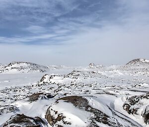 Rocky outcrops amongst a sea of white hills around Peterson Island