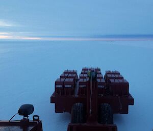 A proof roller is towed over the runway surface at Wilkins