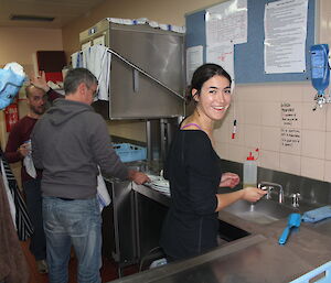 A foreign expeditioner helping out in the kitchen