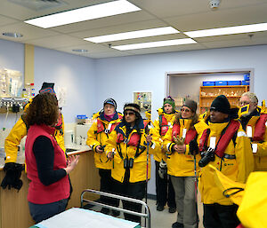 Doctor Jan shows the Medical Unit to cruise ship passengers