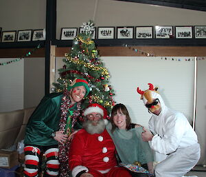 Elf, Santa, Jacki and Randolph the Reindeer