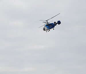 The Russian KA32 helicopter in the air above Davis