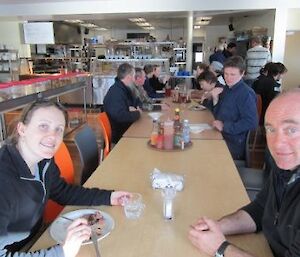 Expeditioners having dinner in the mess